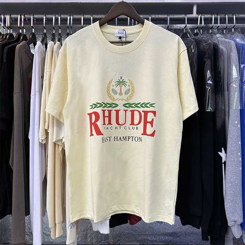 T-shirt da uomo Rhude100% doppio filato puro cotone Beach Coconut Tree Stampa T-shirt casual a slitta corta di alta qualità uomo e donna J240325