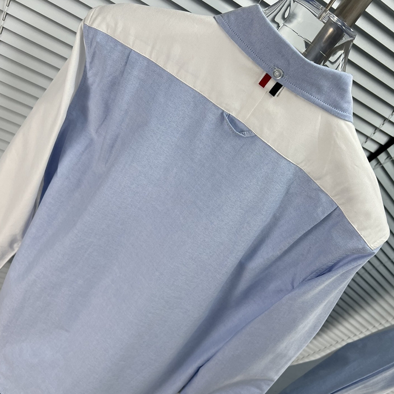 Nuova camicia Oxford slim fit minimalista in puro cotone con abbinamento bicolore bianco e blu