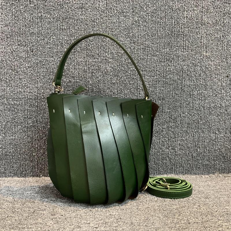 Mode européenne et américaine nouveau sac pour femme en cuir véritable Version coréenne couche supérieure polyvalente rétro peau de vache épissé sac seau à une épaule