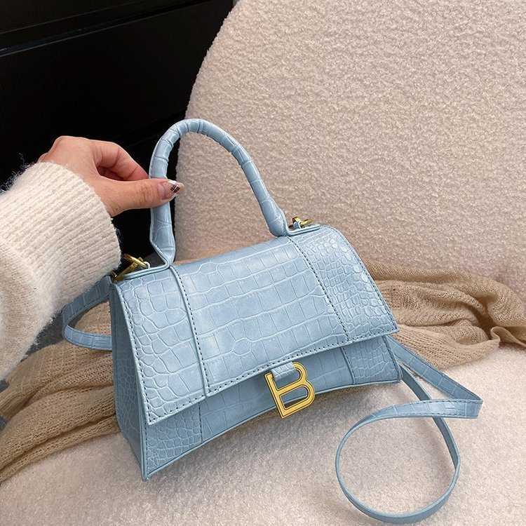 38% OFF Designer bag 2024 Handbags Minimalist Fashionable Bright Leather Casual Shoulder Letter Crossbody Womens Tidal Crocodile Pattern Handbag