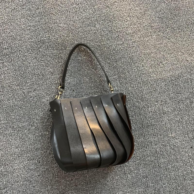 Mode européenne et américaine nouveau sac pour femme en cuir véritable Version coréenne couche supérieure polyvalente rétro peau de vache épissé sac seau à une épaule