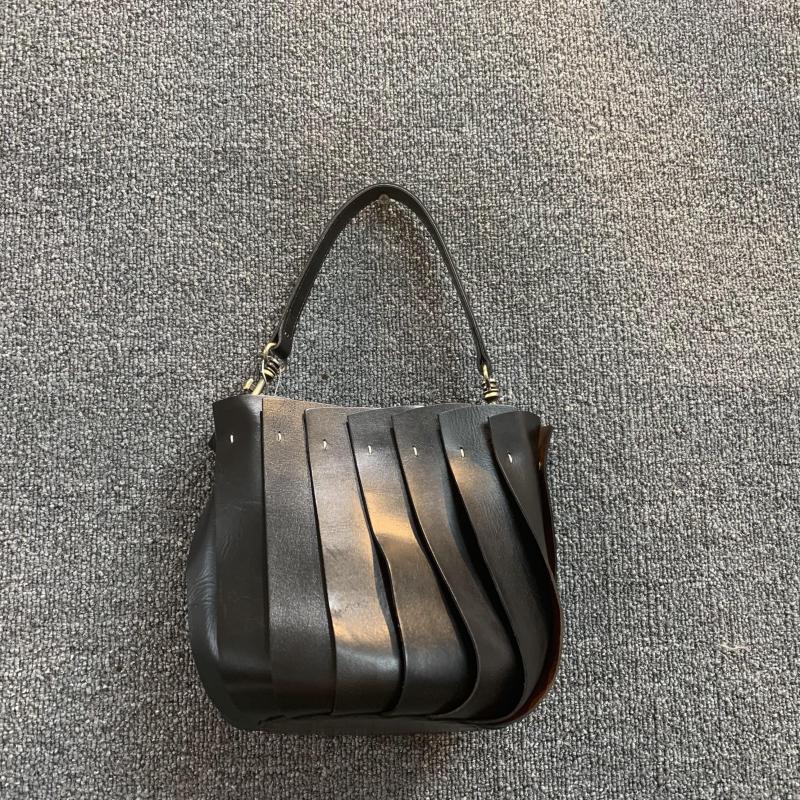 Mode européenne et américaine nouveau sac pour femme en cuir véritable Version coréenne couche supérieure polyvalente rétro peau de vache épissé sac seau à une épaule