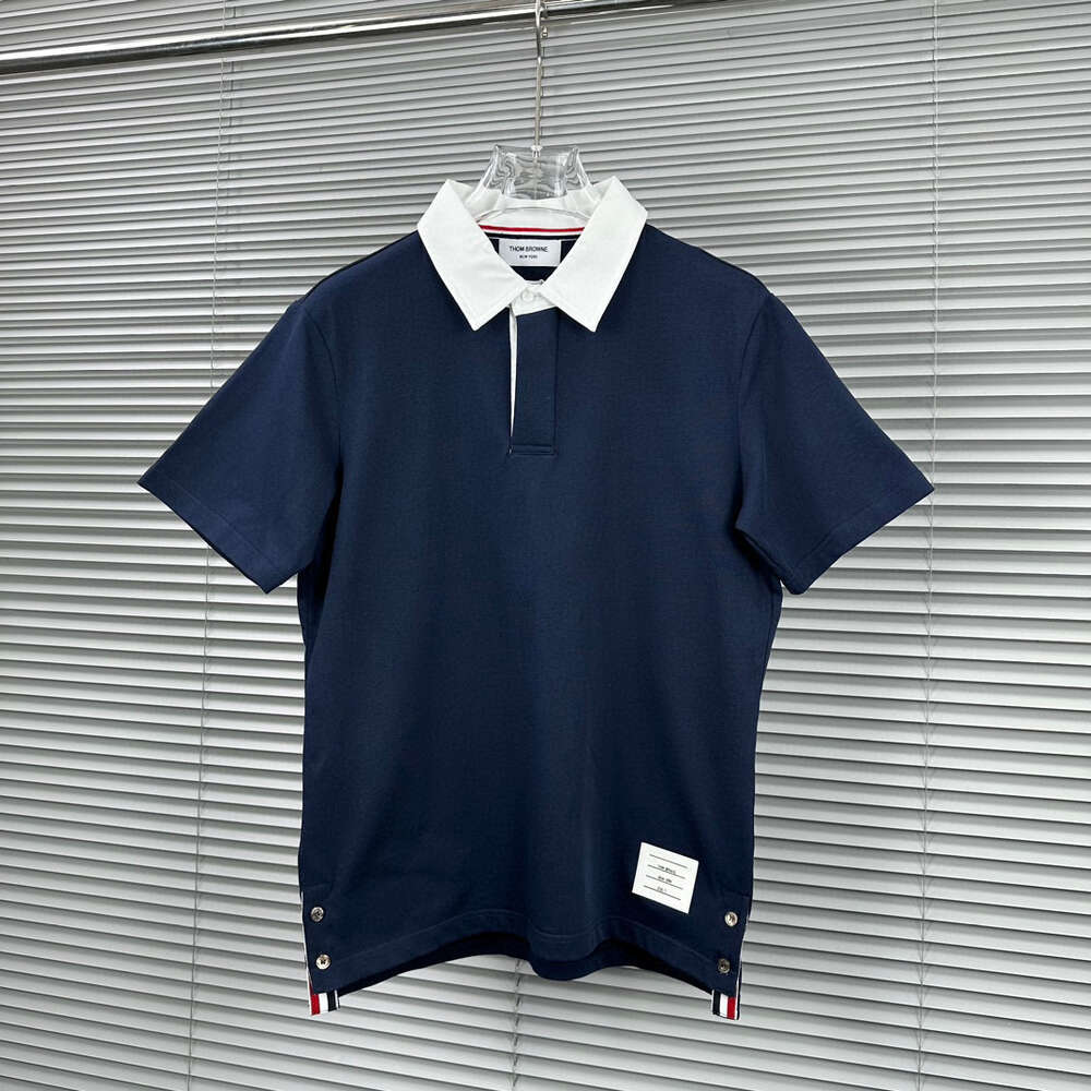 Camiseta de manga corta POLO con botones delanteros y panel de solapa azul marino de moda