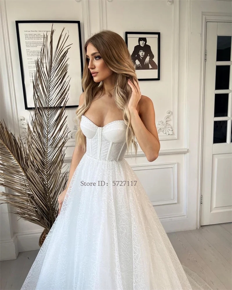 Abiti da sposa principessa classici con scollo a cuore Abiti da sposa in tulle glitter senza maniche Robe de Mariage