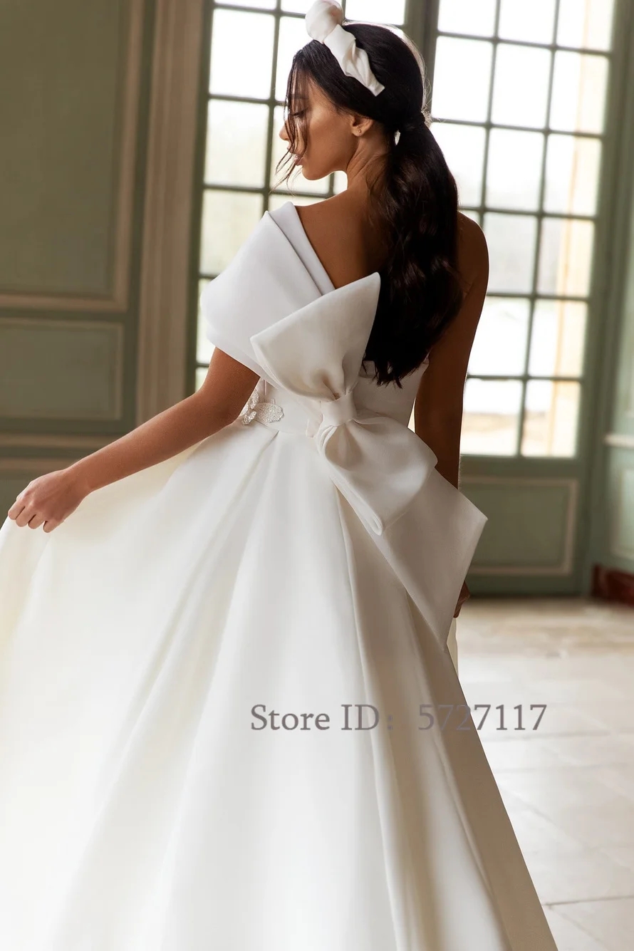 Eleganckie aplikacje na jedno ramię sukienki ślubne podzielone na pannę młodą z kokardką Długą sukienkę na pannę młodą vestidos