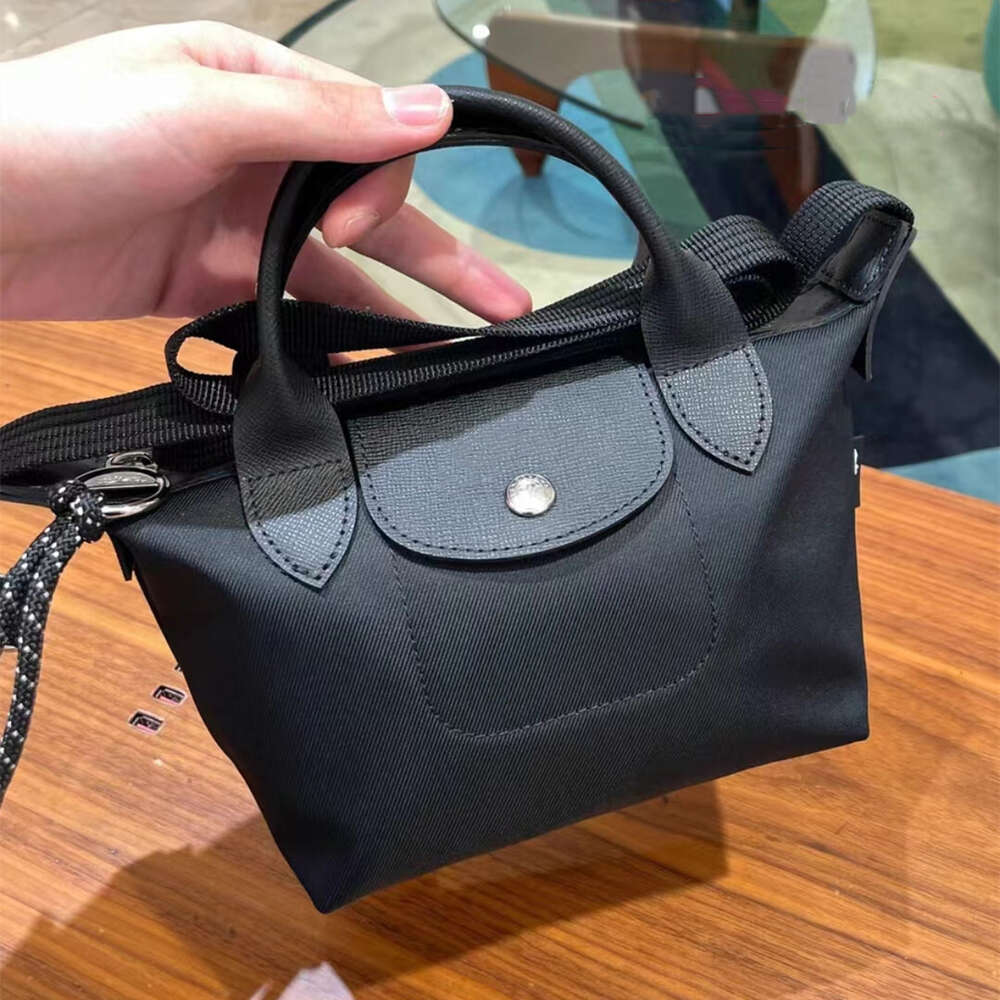 Factory Source High Quality Handbags Is Environmentally Friendly Nylon Energy Series Crossbody Dumpling Bag Mini Thickened Unisex Single Shoulder