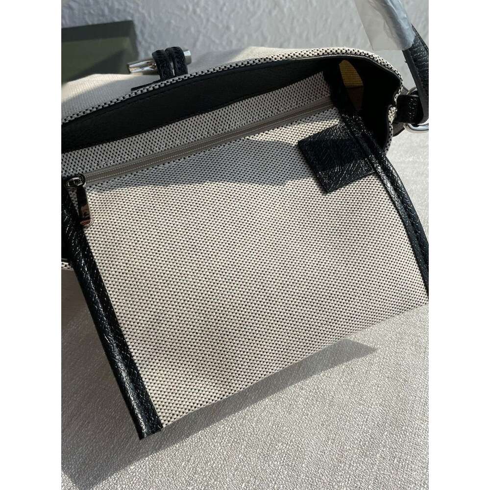Factory Source High Quality Handbags Is New French Canvas Bucket Bag Single Shoulder Crossbody Fashion Longjia Bamboo Knot
