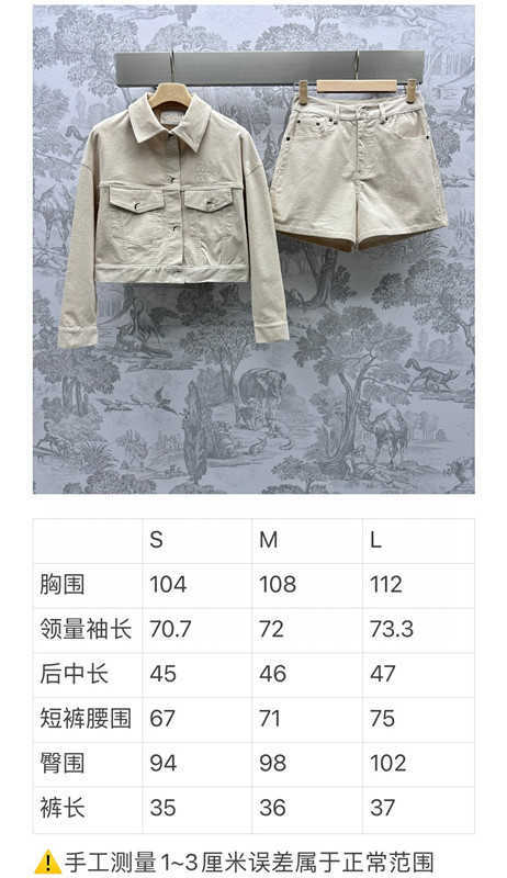 Pantalon deux pièces pour femme marque de créateur printemps/été nouveau Nanyou Miu élégant et lettre de poche veste courte manteau associé à un short ample ensemble 5UV4