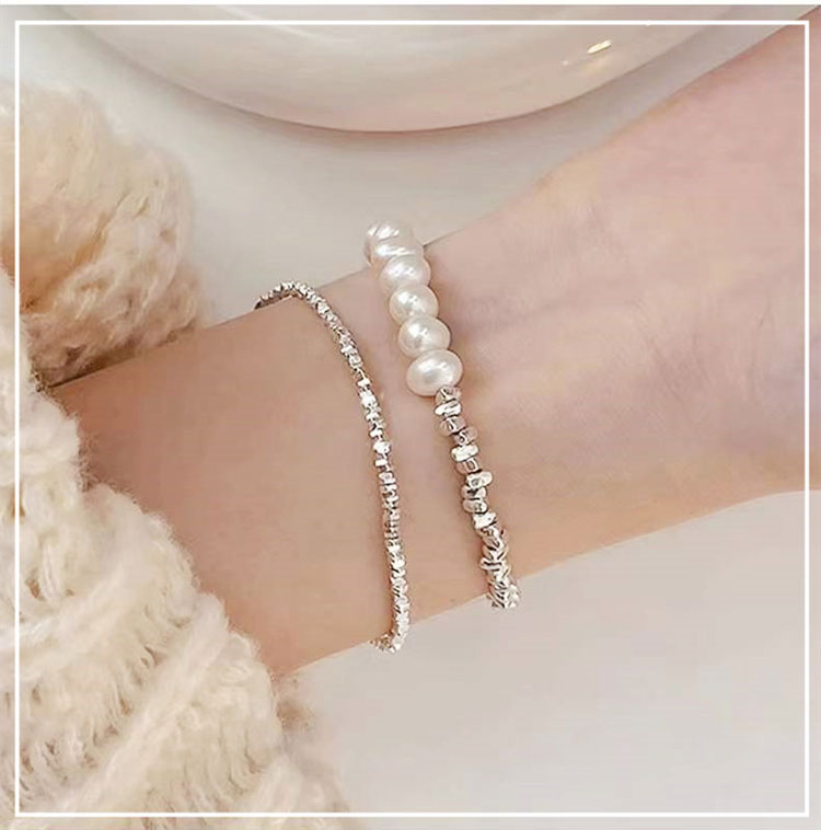 Bracciale di alta moda Bracciale in argento rotto, perla femminile, bracciale barocco in argento puro, lusso leggero e perline semplici, nuova moda di fascia alta 2024