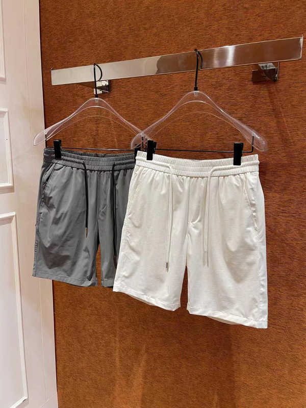 Projektant szortów męskich 2023SS Wang Jia'er Nowy klasyczny letni styl p Family Family Men's Men's Light Washing Shorts z pięcioczęściowymi spodniami 1mnm