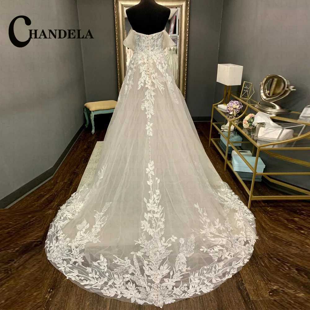 Robes sexy urbaines CHANDELA robe de mariée trapèze attrayante sans bretelles pour femmes mariée dentelle appliques tulle bouton de fermeture éclair chapelle train personnalisé yq240329