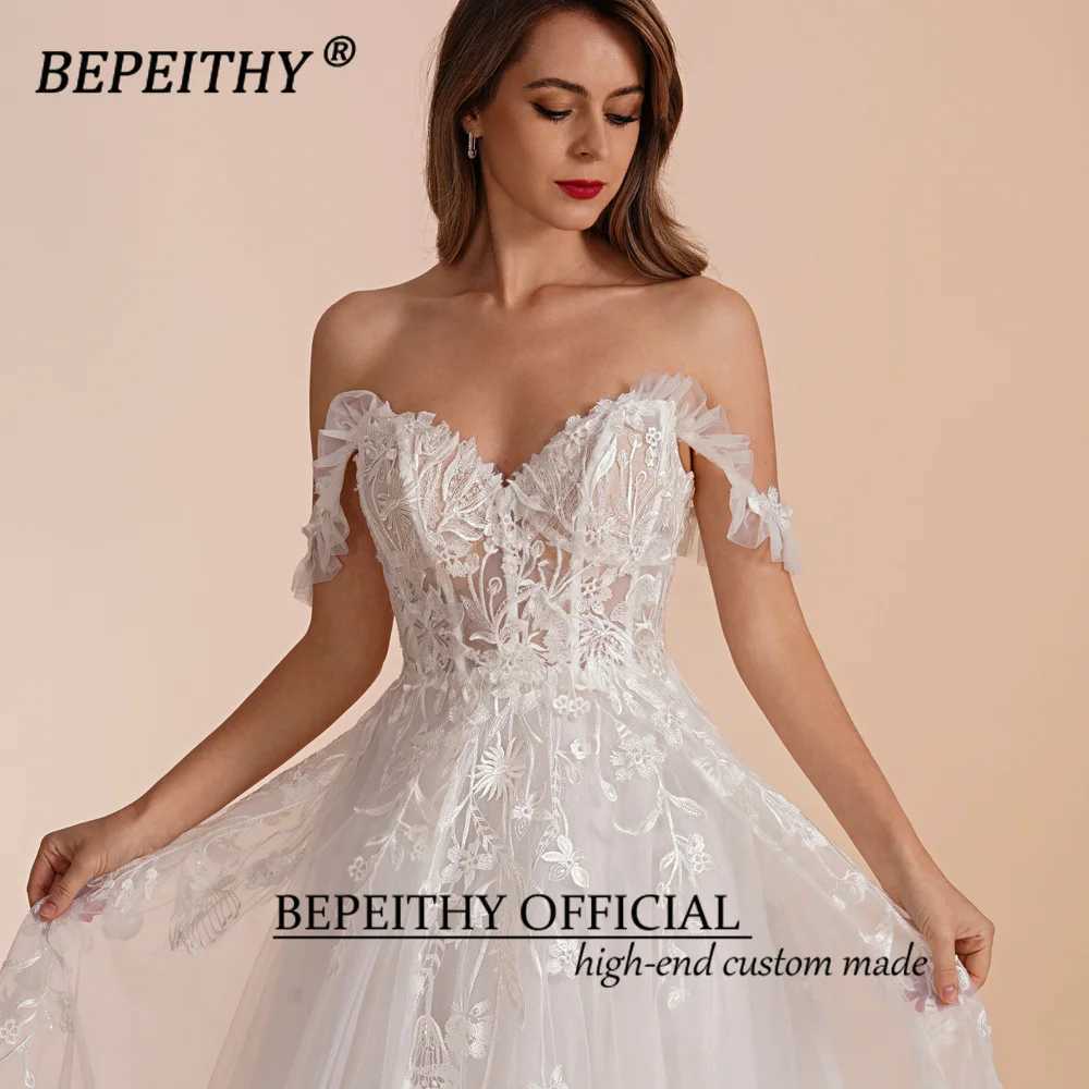 Robes sexy urbaines BEPEITHY Une ligne chérie mariée fête de mariage 2023 sans manches balayage train goutte épaule dentelle ivoire blanc robe de mariée yq240329