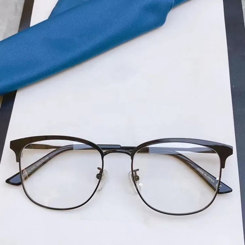 ユニセックス用の新しい高品質のKO413メガネフレームフレームは、処方眼鏡のための軽量眼球板+メタルセミリムゴーグルゴーグル53-18-145フルセットオーギルケース