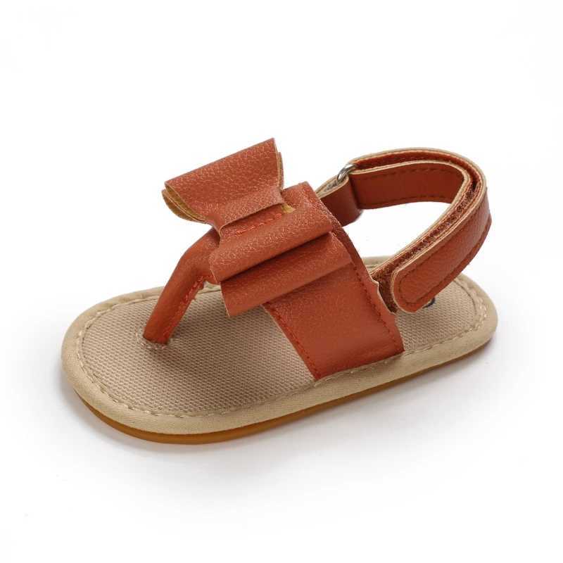 Sandaler 2023 sommar nya sandaler för baby flickor brun båge dekoration anti glid gummi mjuka sula plattskor pu första vandrare nyfödda 0-18m 240329