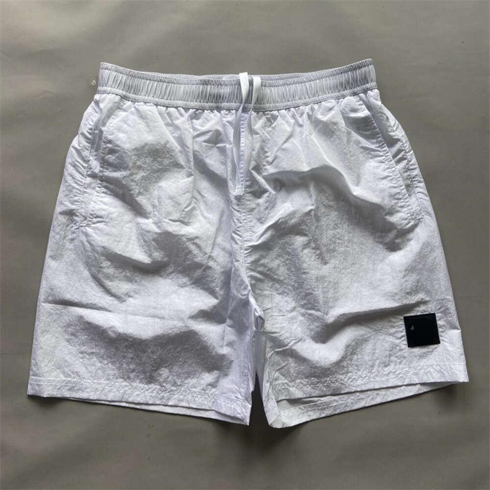 Nya klassiska mäns utomhus Casual Löst montering Snabbtorkande metall Nylon 5 Point med trendiga märkeshorts