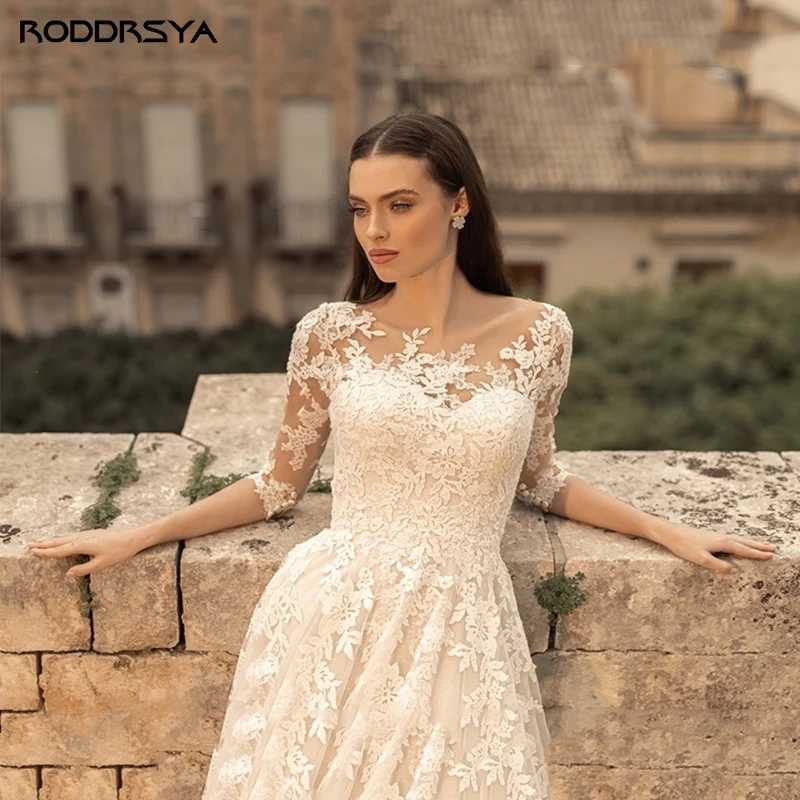 Robes sexy urbaines RODDRSYA robe de mariée vintage col rond manches 3/4 en dentelle robes de mariée appliques en tulle balayage train Boho vestidos de novia 2023 yq240329