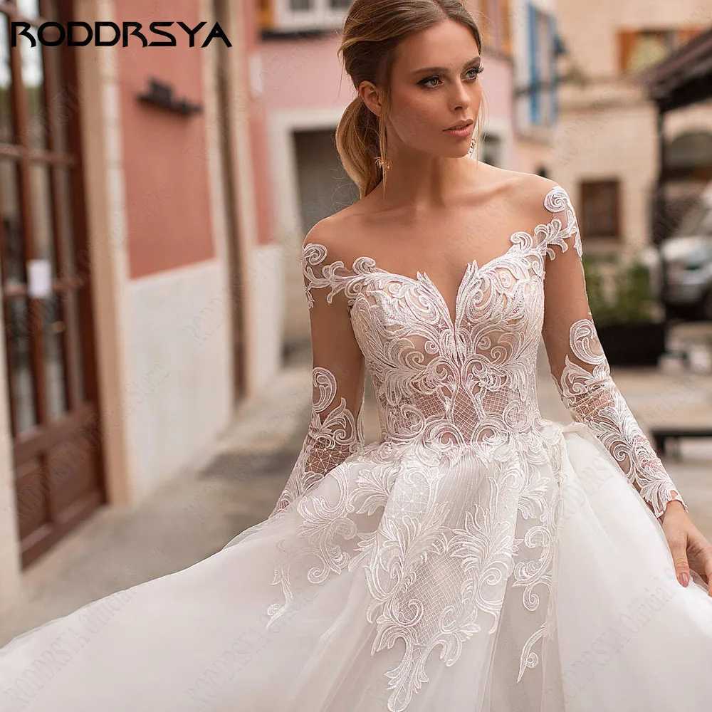 Abiti sexy urbani RODDRSYA Principessa Matrimonio Boho Style Illusion Maniche lunghe Scoop Abiti da sposa Applique in pizzo A-Line Abiti da sposa yq240329