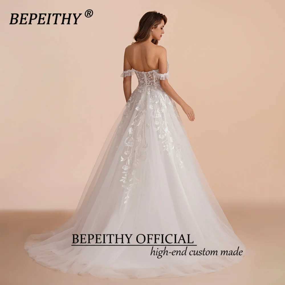 Robes sexy urbaines BEPEITHY Une ligne chérie mariée fête de mariage 2023 sans manches balayage train goutte épaule dentelle ivoire blanc robe de mariée yq240329