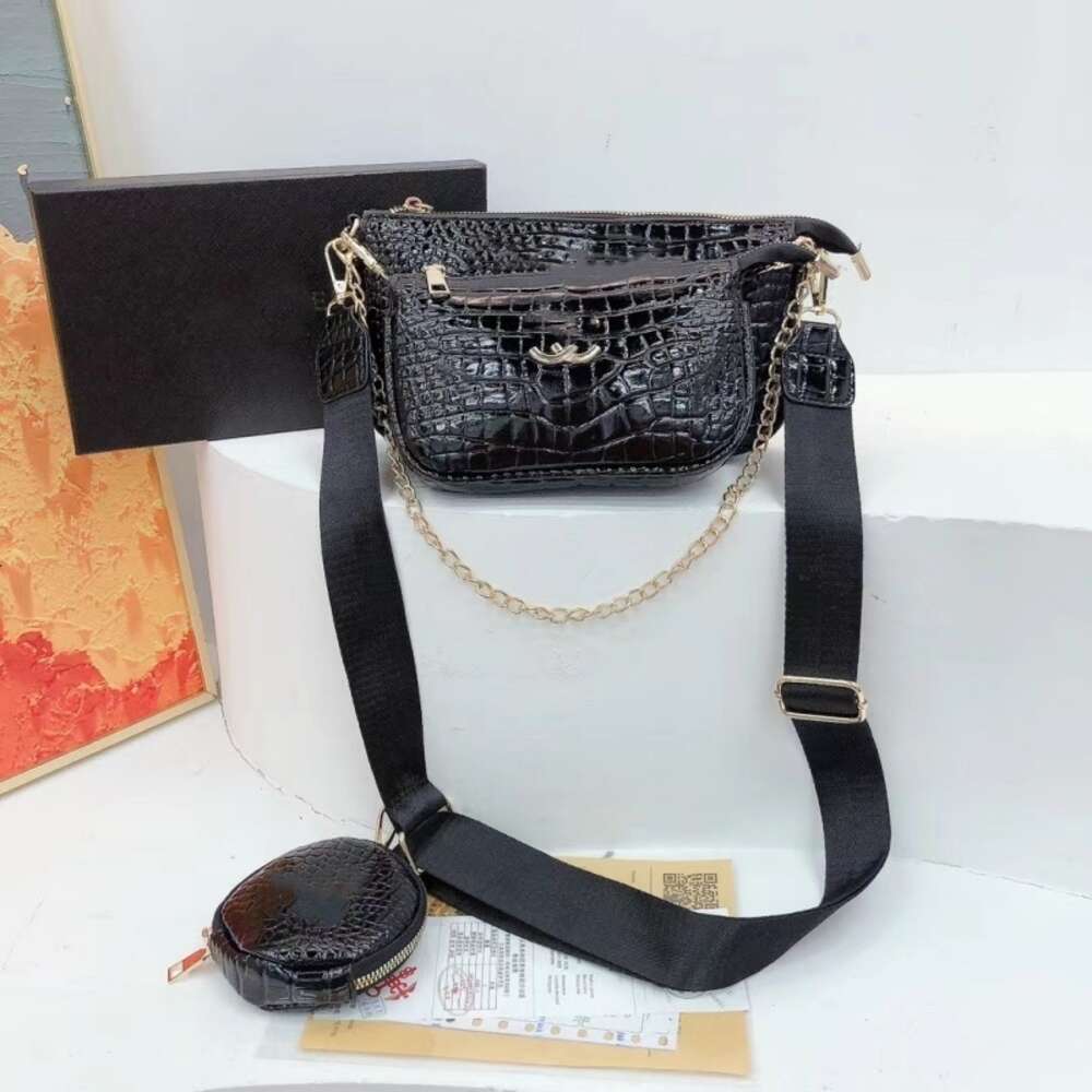 Bolsa de couro designer vende bolsas femininas de marca com 50% de desconto nova bolsa feminina pequena quadrada e conjunto de um ombro crossbody