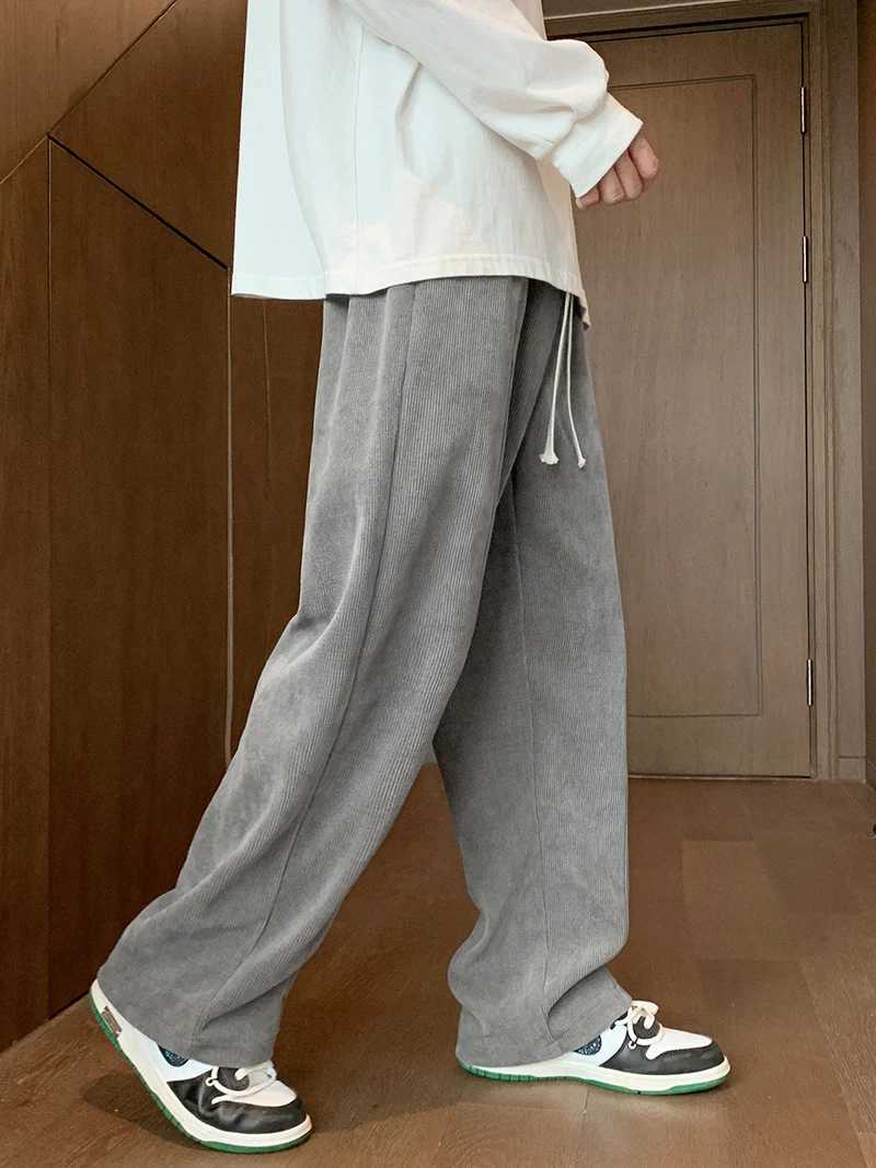 Herenbroeken lente en herfstheren sportbroek Koreaanse mode wijd been rechte casual baan broek losse corduroy thuis broekl2405