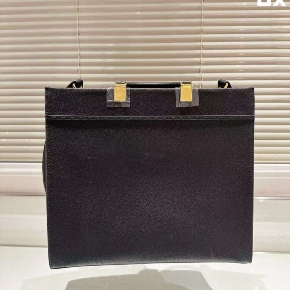 Trabalhador de bolsa de couro de luxo, versão coreana de bolsas de couro novo novo ombro de ombro único Capacidade feminina