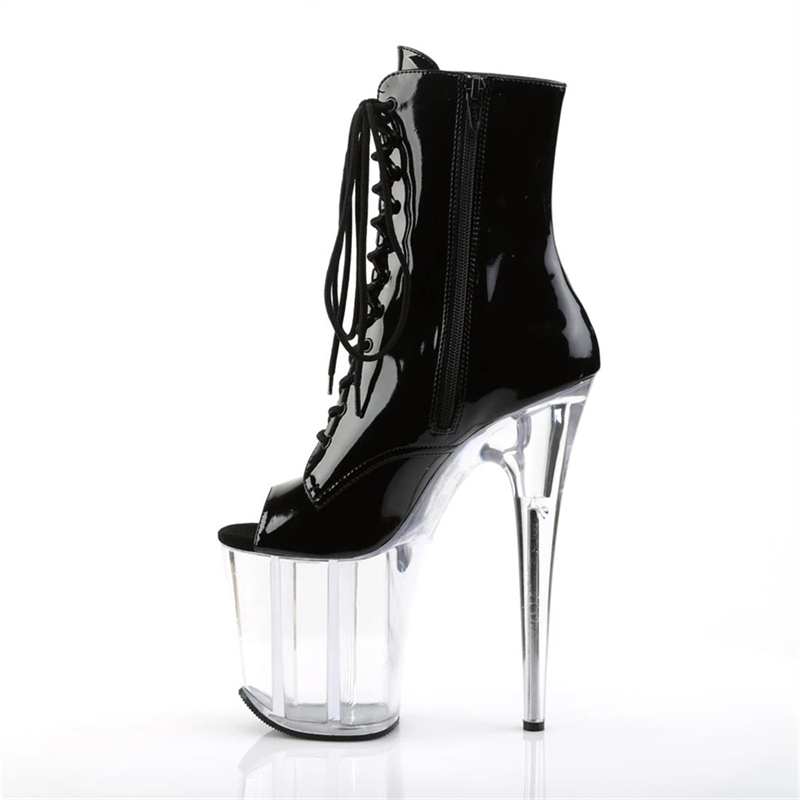 Botones de cuero de patente negro de 20 cm, fondo transparente, tacones ultra altos sexys y botas cortas frente a clubes nocturnos.