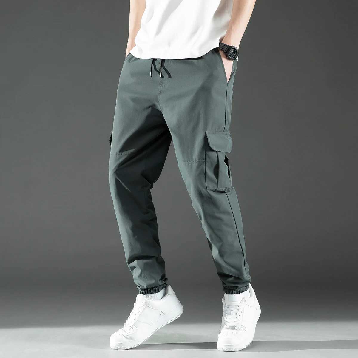 Herrenhosen mittlerer Taille modisches gebürstetes Design für Herrenhosen Polyester verpackt heißes Date Warenhosen Pocketsl2405