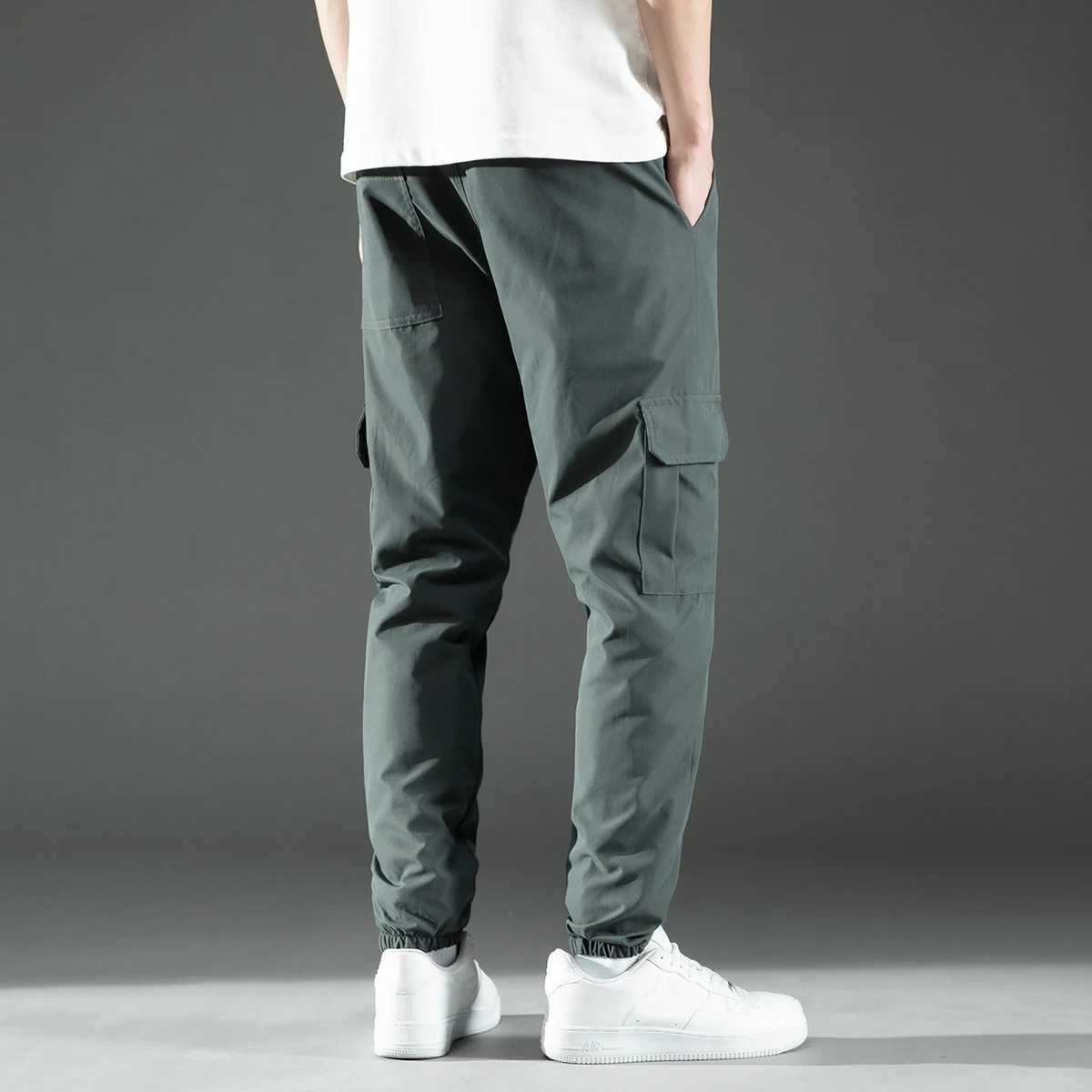 Herrenhosen mittlerer Taille modisches gebürstetes Design für Herrenhosen Polyester verpackt heißes Date Warenhosen Pocketsl2405