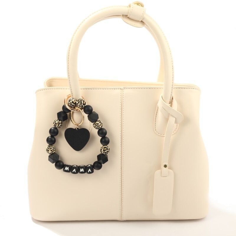 Venta de nuevo Heart de Peach Heart Black Leopard Silicone Bead Bead Chain Cadena Key Mama Letter Bags Hanging Ornaments