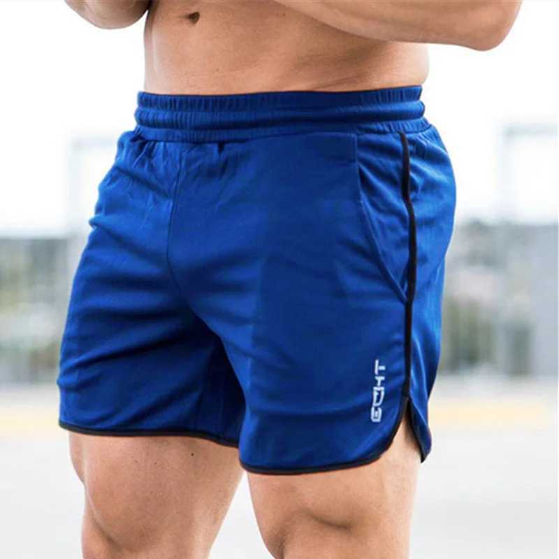 Shorts maschile uomini cortometraggi di fitness palestre estive allenamento maschio a maglie traspirabili a maglie a secco rapido jogger short pantaloni pantaloni uomini y240507394b