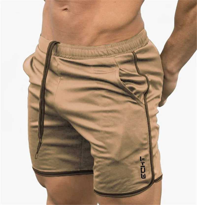 Shorts maschile uomini cortometraggi di fitness palestre estive allenamento maschio a maglie traspirabili a maglie a secco rapido jogger short pantaloni pantaloni uomini y240507394b