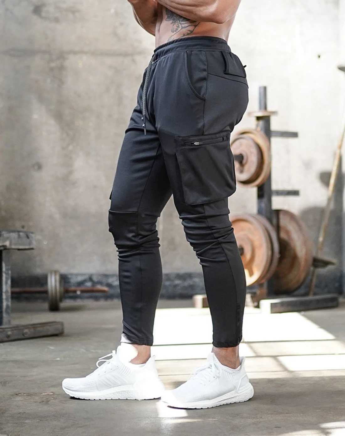 Calça masculina masculino escuro leggings correndo calças de jogging joggers strtwear calças de vários bolsos esportivos de treinamento de baixo