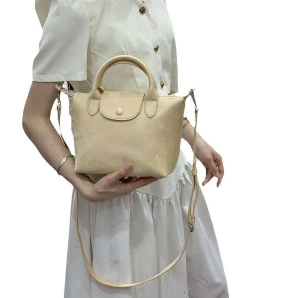 Longxiang Dumpling Sac Femmes Véricères en cuir authentique Sac à main de style National Craft Single Single Crossbody Large Capacité 6603