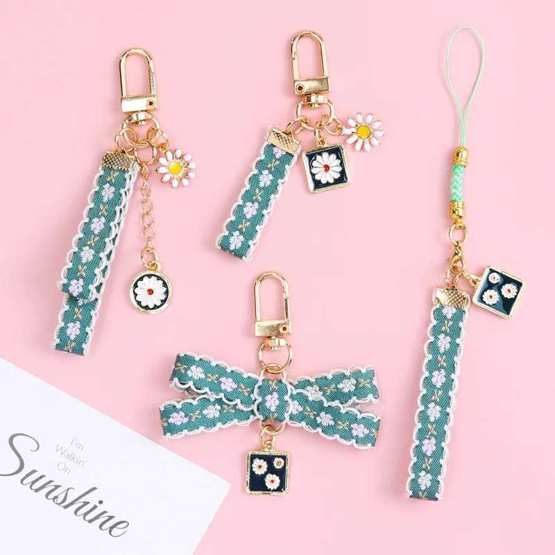 Keychains Lanyards Korean Tren Lace Fabric Keychain Ly Ribbon Flower Keyring Women smycken Solros söta väska Tillbehör Bil Key Holder Gift J240509