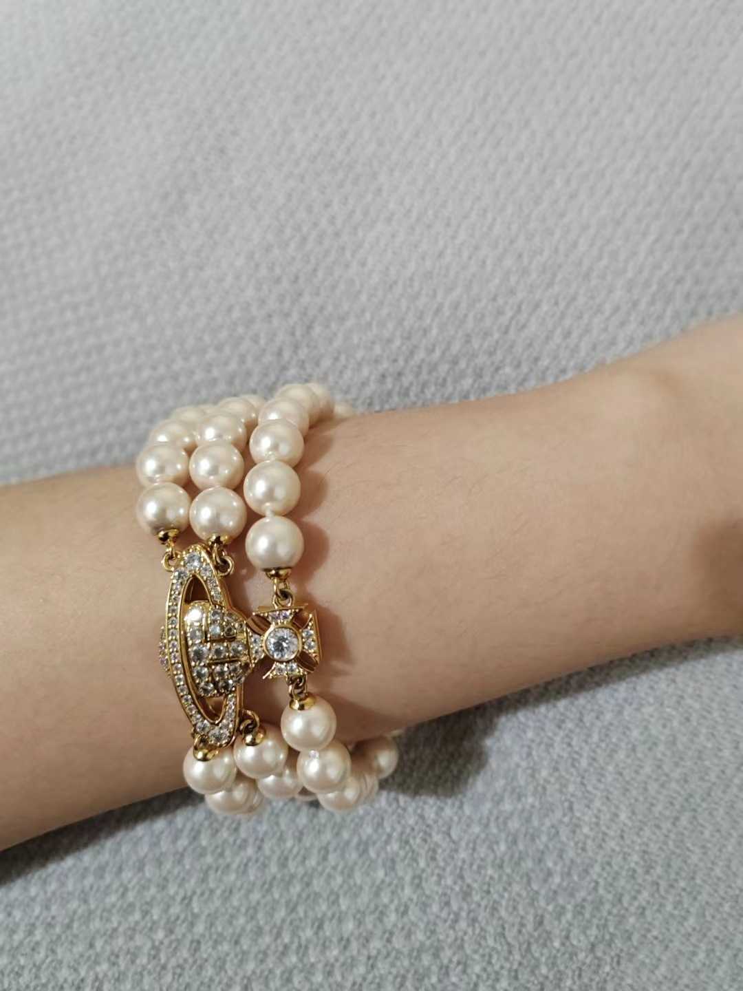 Charme Nouvelle boucle magnétique Westwood Bracelet de perle de perle de perle de perle