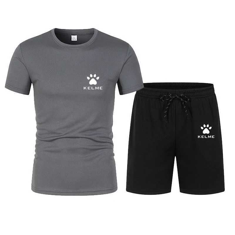 Suits-survêtement masculins 2024 NOUVEAUX MASSEMENTS MENSEMENTS SPORTS SPORTS SUMBREST SETSWARS MERS SPORTS T-shirt à manches courtes + shorts séchés rapides 2 pièces Y240508