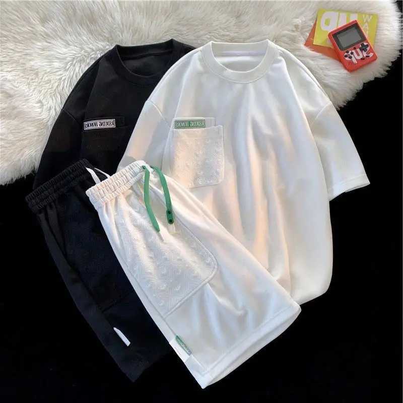 Men's Tracksuits Summer loose short sleeved set for couples O-neck pocket simple casual wild T-shirt mens two-piece setL2405