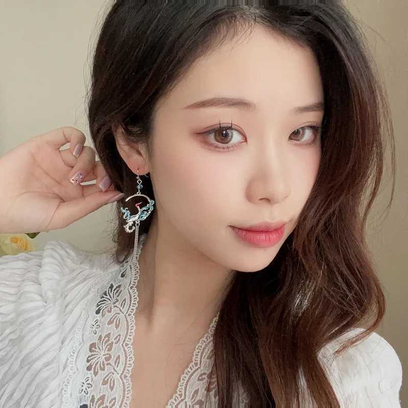 Dangle Kronleuchter neuer Modeklappfan Crane Dangle Ohrringe für Frauen chinesischer Stil asymmetrischer langer Quasten Temperament Ohrring Party Schmuck