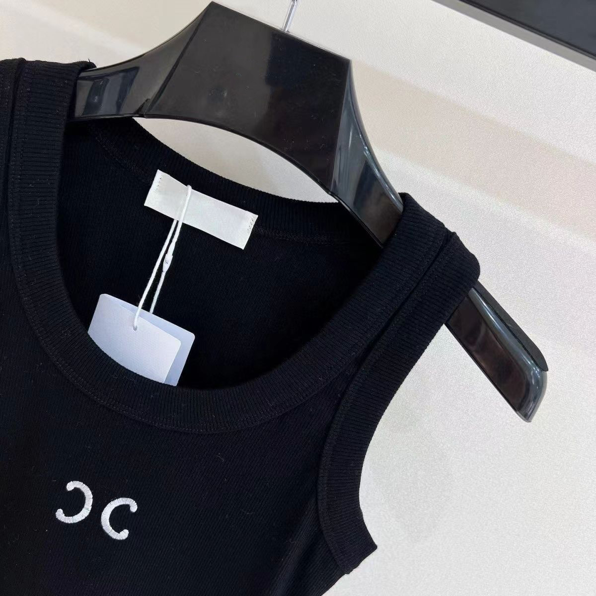 Tabbure de mode Femmes Logo de broderie Tops Femmes Été Short Slim nombril exposée tenue élastique Sports Tanks tricotés