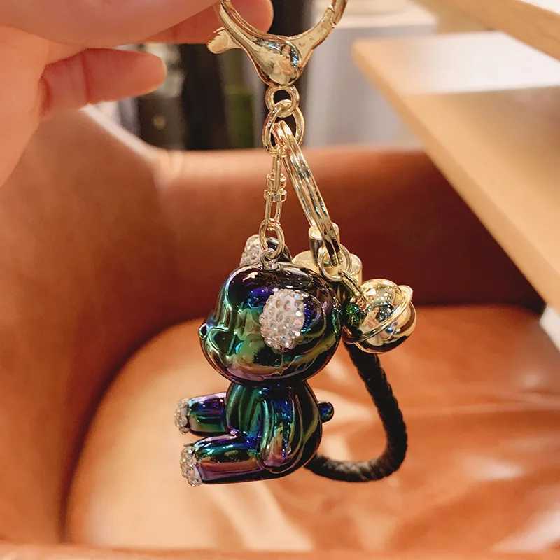 Keychains Lonyards Chain de clé ours électroplate avec une corde en cuir tissé Pendante Animal Keychain Fashion Doll Sac Auto Key pour filles Cadeau J240509