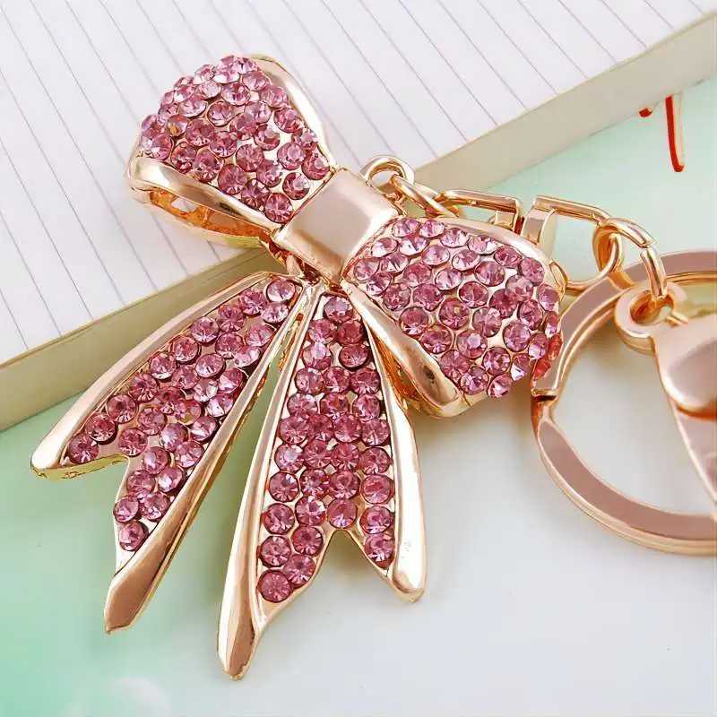 Keychains Lanyards Spirtly Golden Color Rhinestone Bow Keychains For WomenCharms för viktiga handväskor Ryggsäckar Bästa gåvor för mamma J240509