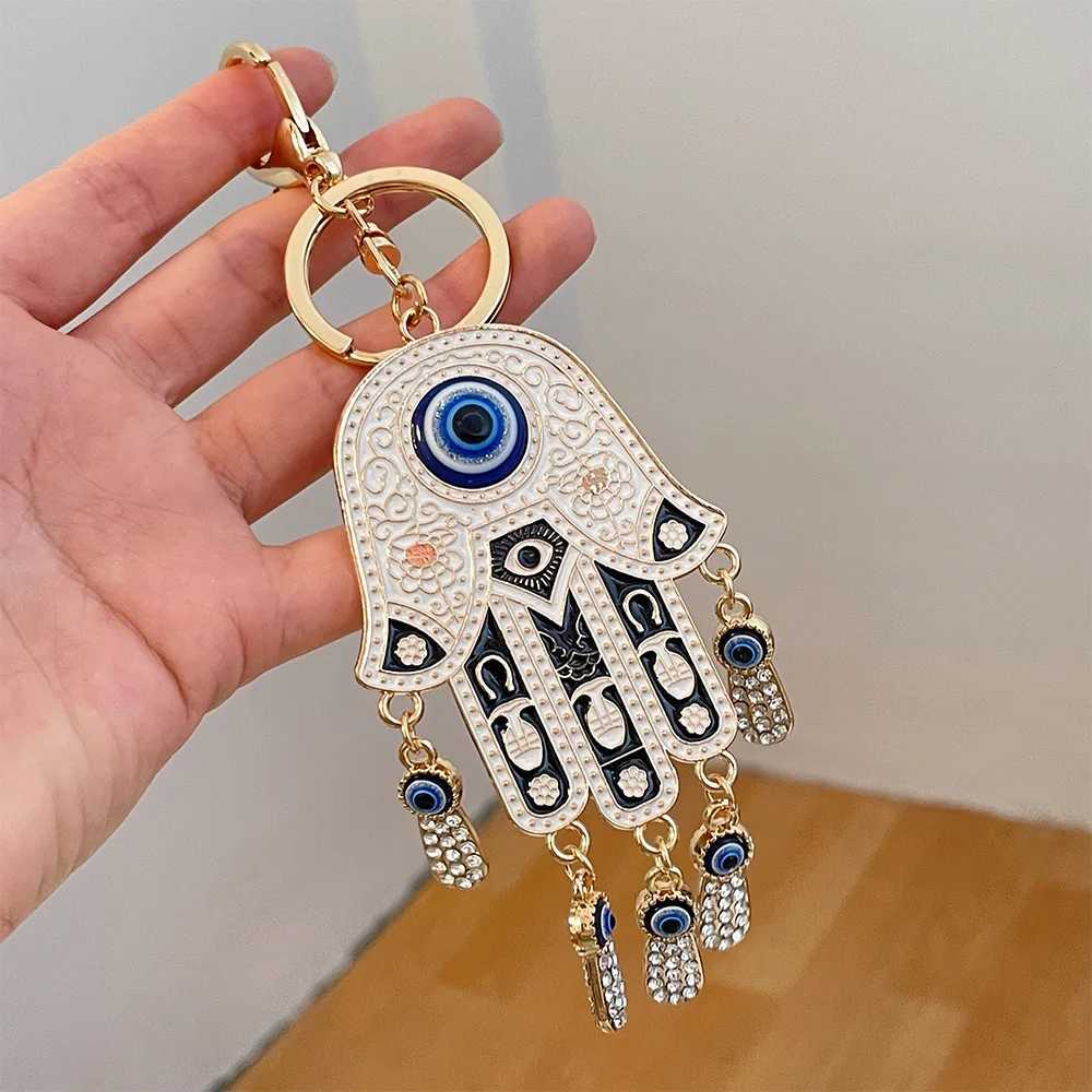 Keychains Lanyards Evil Eye Keychain for Women Hamsa Hand Reinestone Keychain Blue Hamsa Hand Keyring Blue Eyes Car Keychain for Men and Women Gift J240509