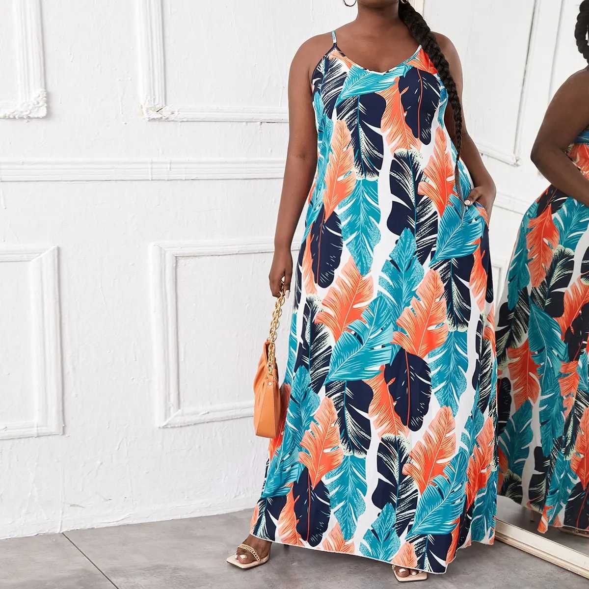 Plus -Size -Kleider 2023 Sommer Europäischer und amerikanischer Damen Plus Größe gedruckt lose Mop -Kleid Y240510