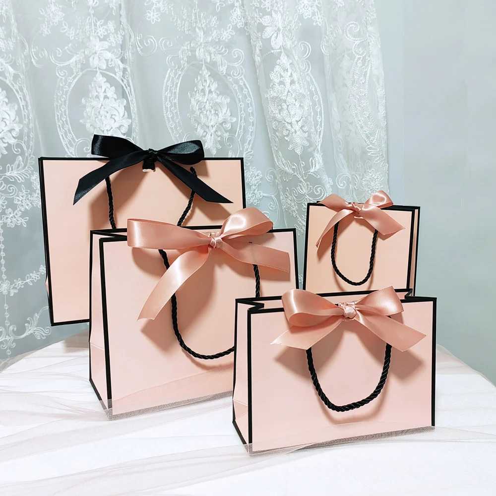 Borsa confezionamento da regalo Boxaging Box Bride Decorazione matrimoni Pink Kraft Festa baby Shower Book Belt Hand Honey Ribbonq240511