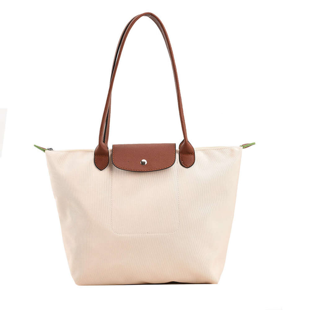 Designer -Taschen -Läden sind 95% Rabatt auf neue französische 70. Jubiläumsklassiker Nylon -Tasche mit großer Kapazität mit einer Schulter -Unterarm -Handtasche 35