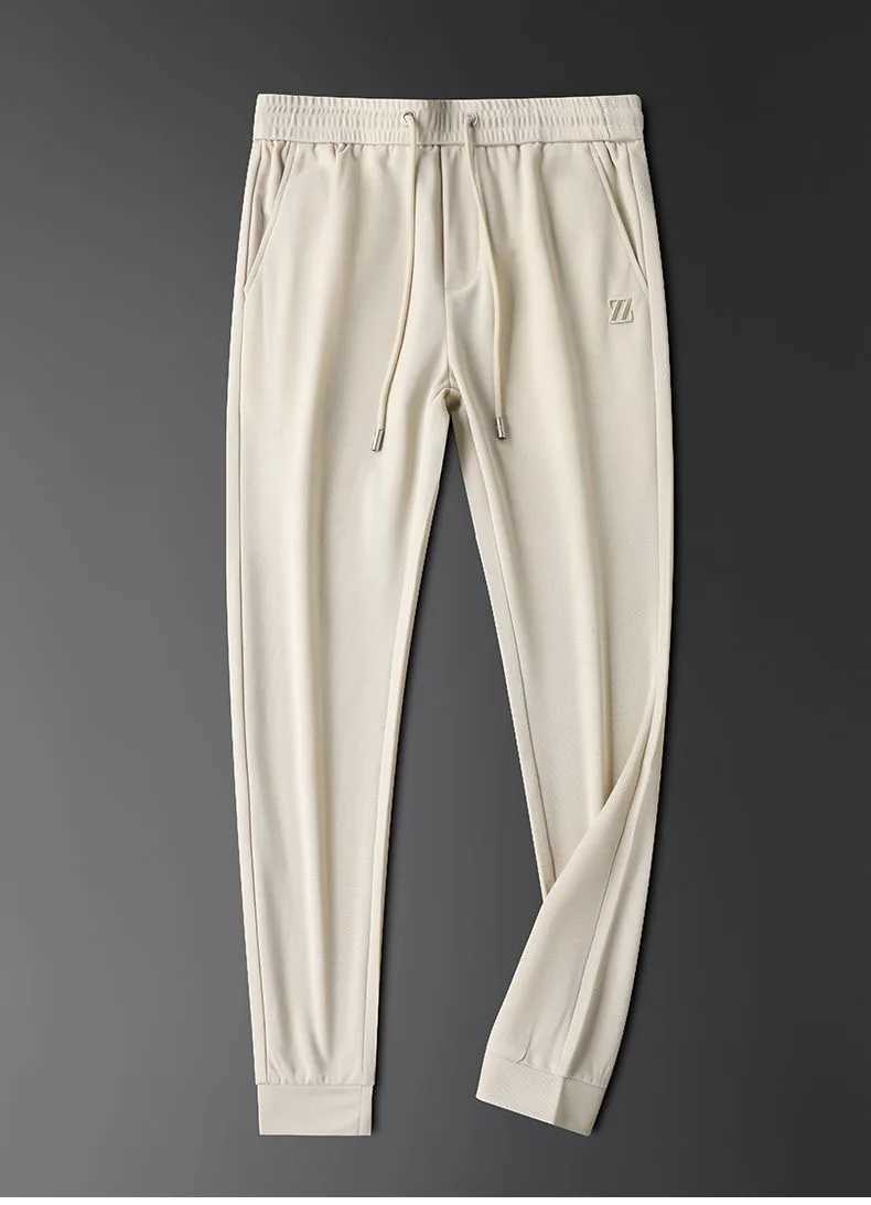 Herenbroeken Licht Luxe merk Ice Silk Soft Soft Comfortabele Casual broek Mens Fashion Z-Letter Borduurwerk Zomer Dunne Ademende sportbroek Y240513