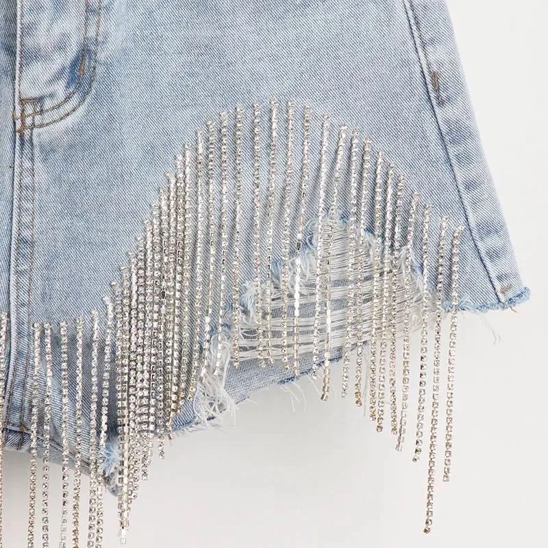 Diseñador de mujeres Jeans rasgados flacos Cortos Cortos Mini pantalones calientes tangas Diamante Tassel Casual Booty apretado