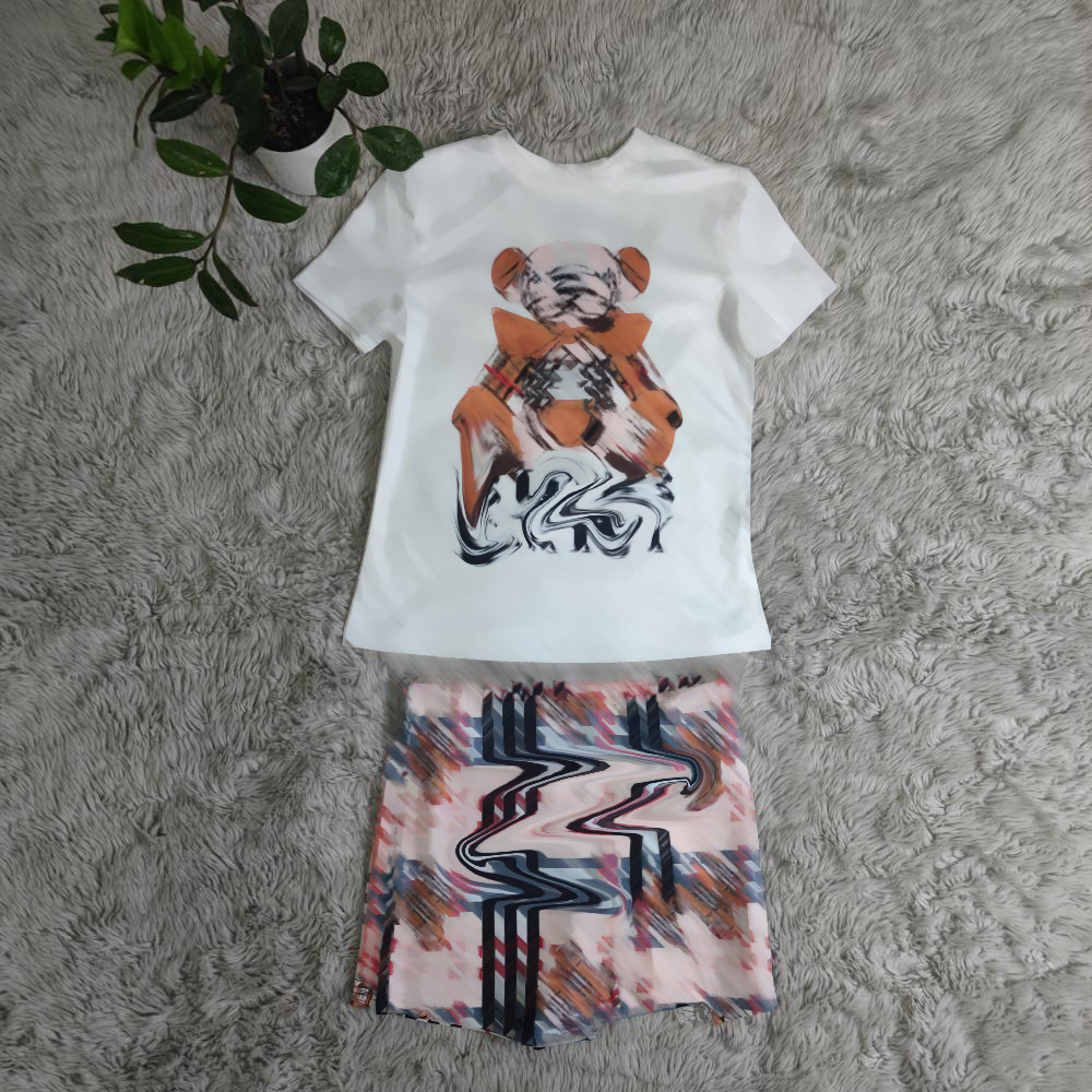 Koszule kobiece i krótkie spódnice Linia Mid Sukienka Summer Kobiety Dwuczęściowe sukienki z czołgiem T-shirt i czarne plisowane krótkie stroje spódnicy