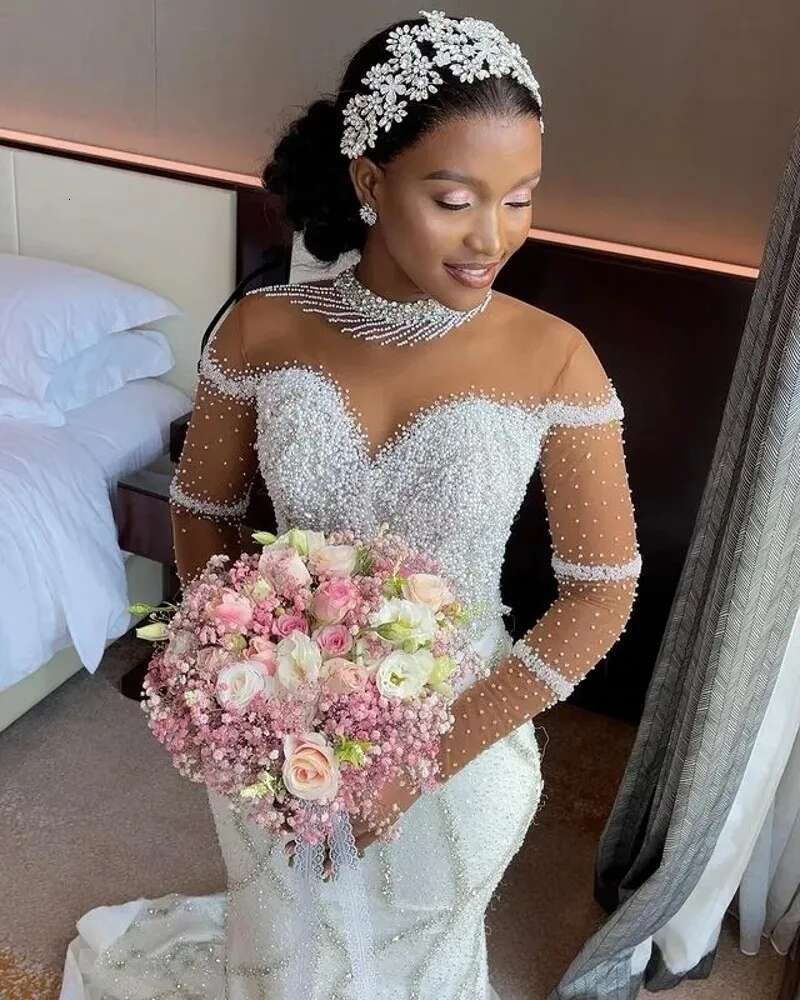 Afrikansk sjöjungfru bröllopsklänning 2024 Sheer Neck Pärlor Pärlor Brudklänning Löstagbart tåg Långa ärmar Plus Size Vestidos