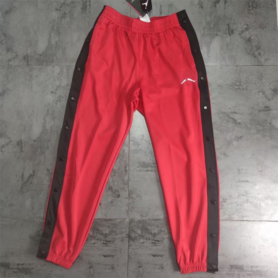 Pantaloni della tuta da uomo con fibbia ai piedi pantaloni con fibbia pantaloni da basket della fila laterale pantaloni della tuta con bottoni allenamento sciolto riscaldamento